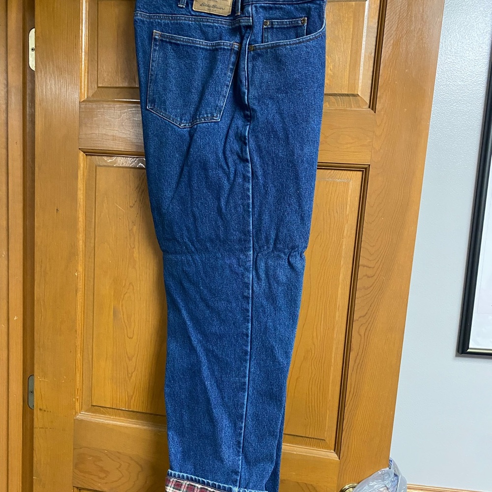 Eddie Bauer flannel lined blue jeans 38X30 Tall.  Warm and perfect condition.